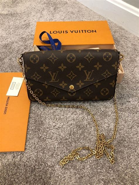 louis vuitton purse with gold chain|black louis vuitton shoulder bag.